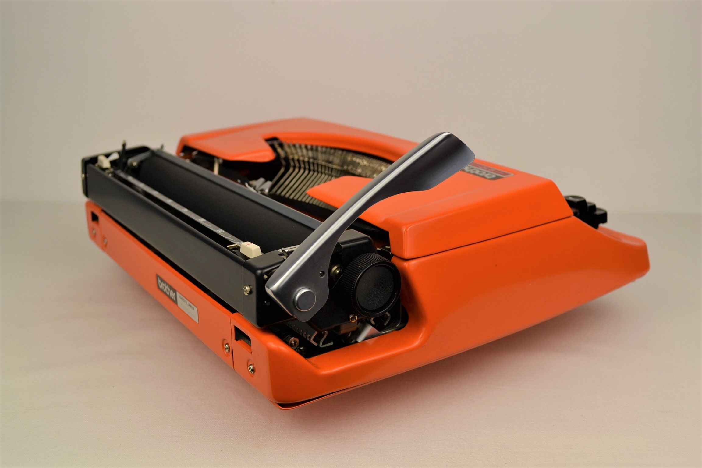 Typewriter Brother 210 orange 1970s