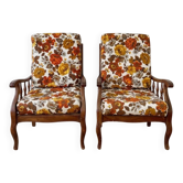 Pair of vintage 70s armchairs in wood and floral fabric.