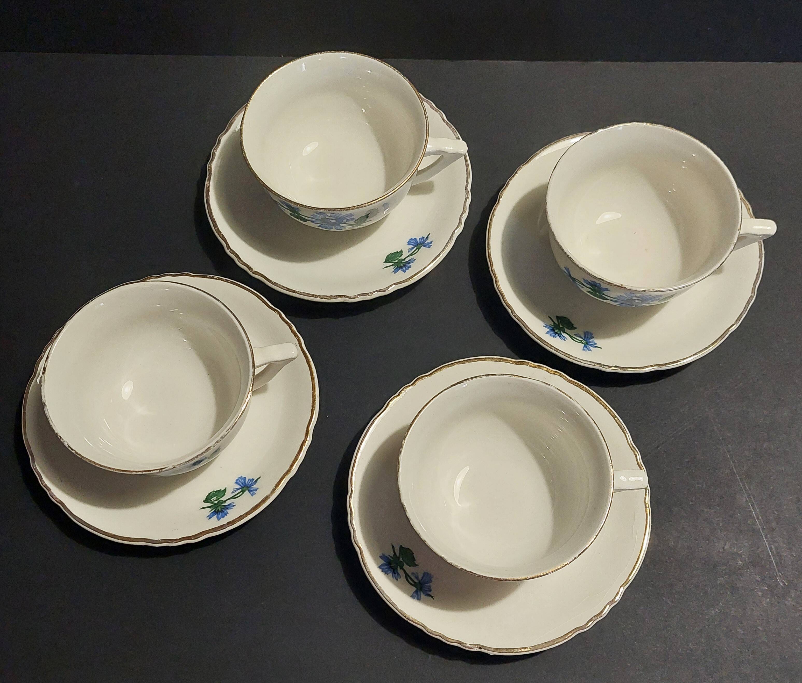 Series of four Orchies earthenware cups with chicory flower decoration
