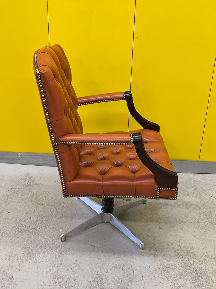 Vintage orange leather buttoned back gainsborough swivel desk chair from 1980