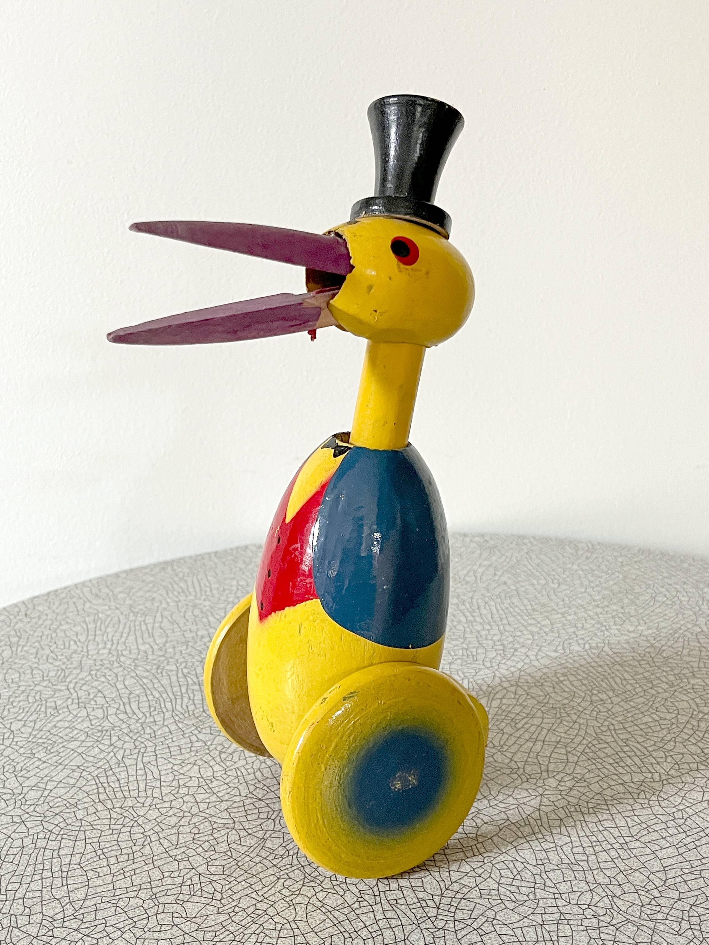 Old push toy, wooden stork