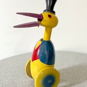 Ancien jouet à pousser, cigogne en bois