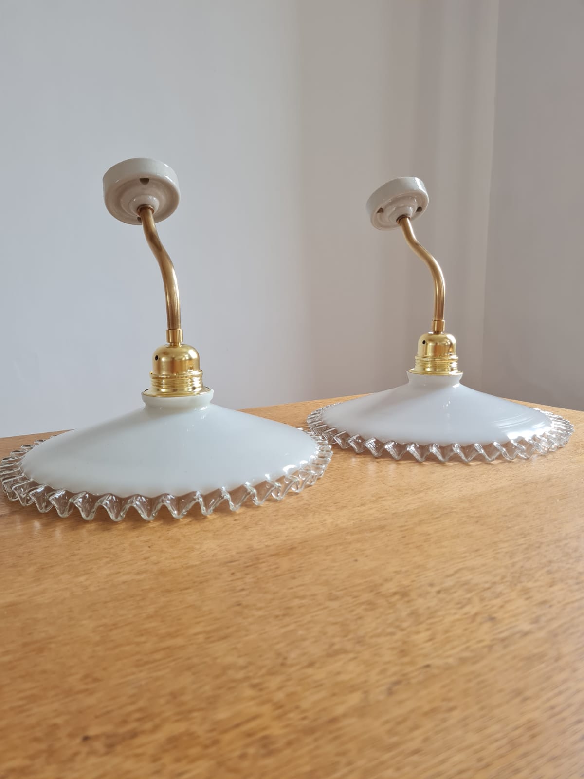 Pair of opaline wall lamps