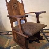 Antique arts and crafts carved oak armchair, 1910