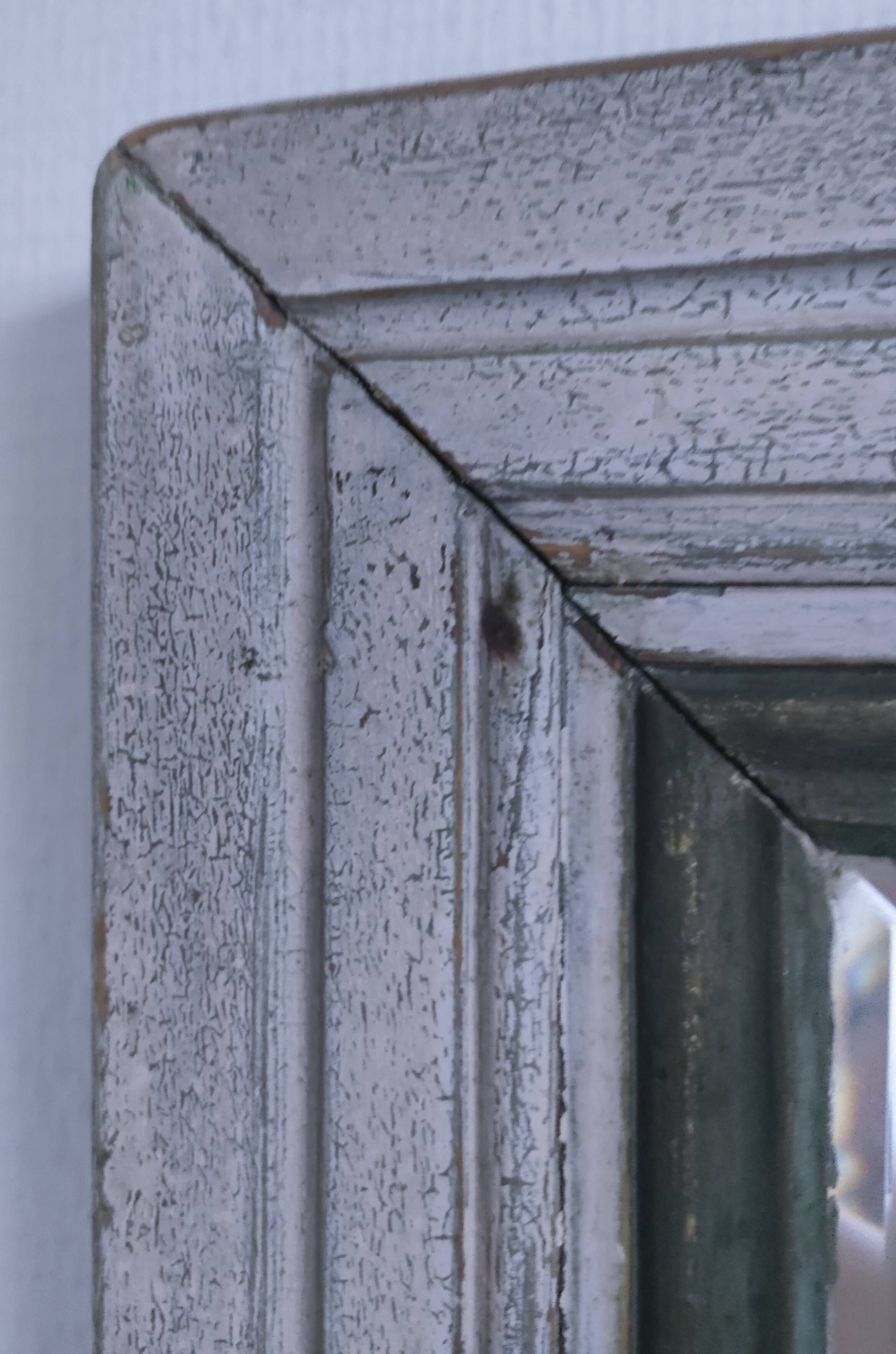 Beveled mirror patinated wood early 20th century