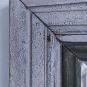 Miroir biseauté bois patiné début xxème