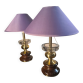 A pair of vintage table lamps featuring a turned wooden base, accessories...