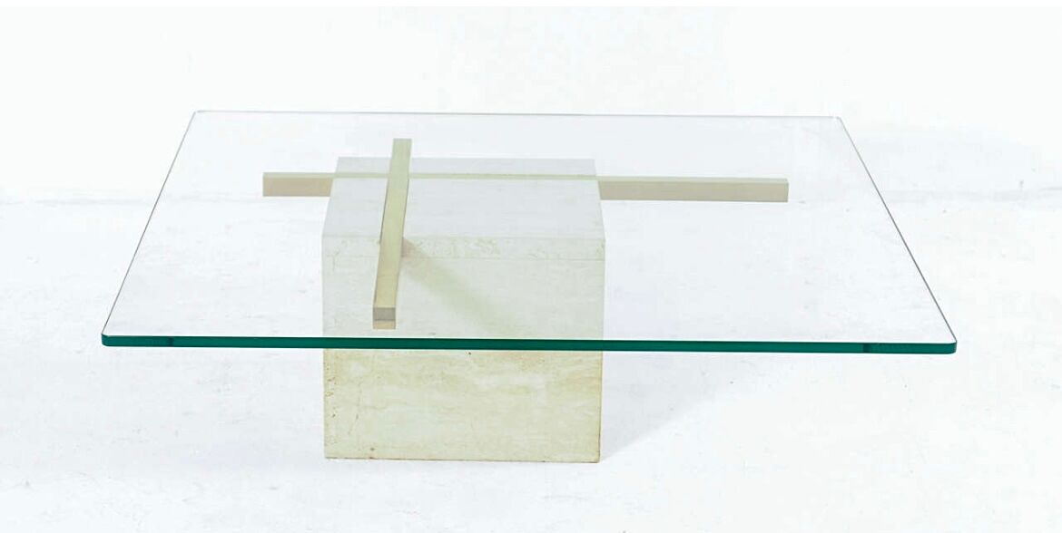 Coffee table with travertine gold-plated cross base and glass top