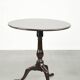 Practical round antique English tilt top table from the 18th century