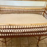 Vintage rattan baby bed with wheels