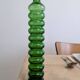 Pair of vintage ribbed blown glass bottles with cork stoppers.