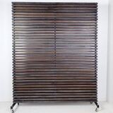 Slatted wood panel room divider or slatted coat rack with 10 mobile hooks