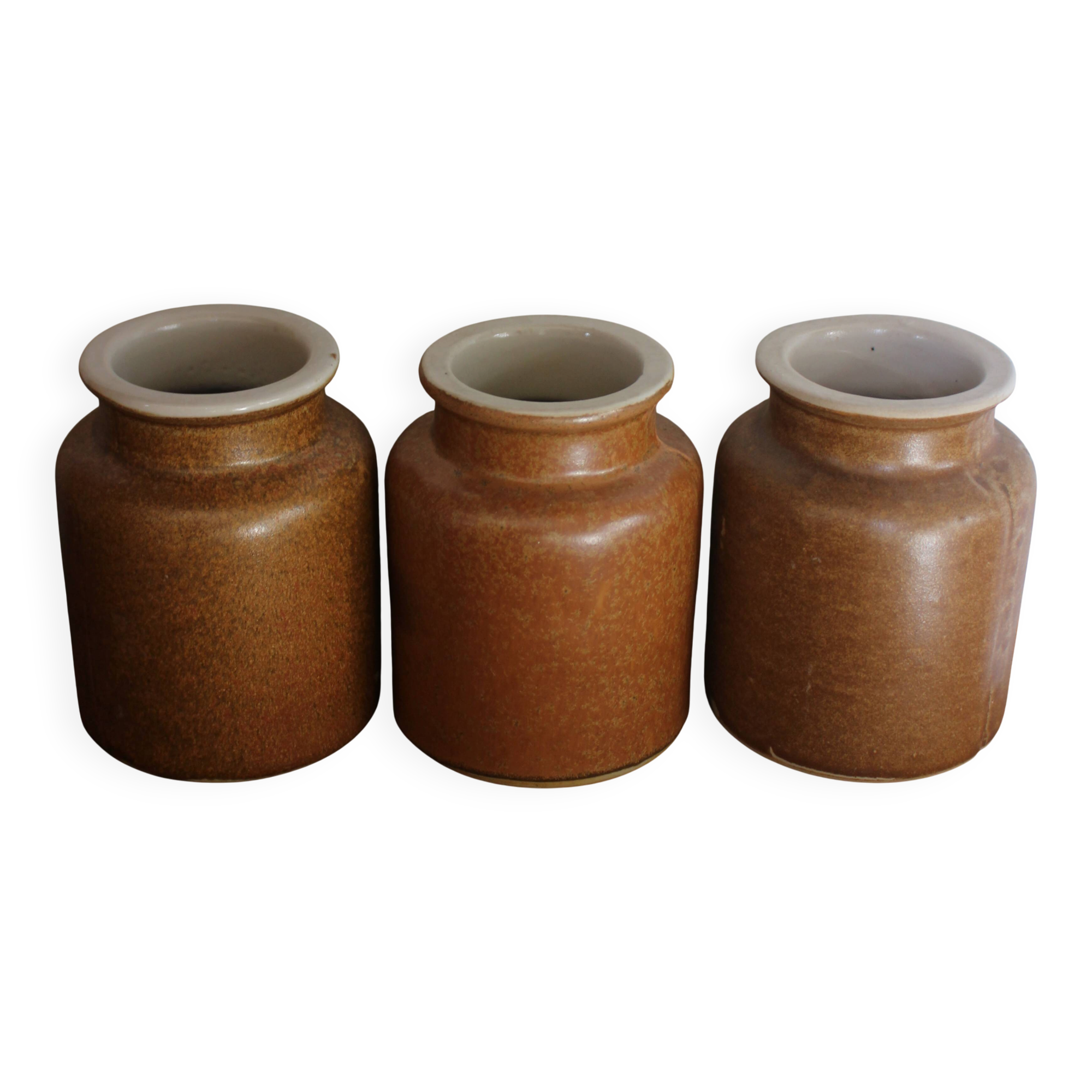A set of 3 vintage glazed stoneware vases for indoor use.
