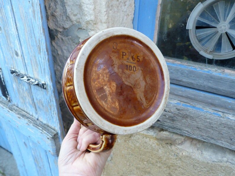 Former wine pitcher in glazed earth style bistrot auberge