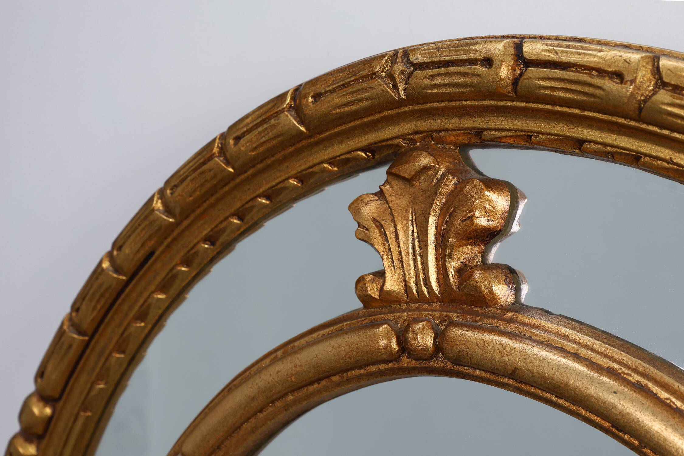 20th century neo-classical style tilted oval mirror by Deknudt, Belgium