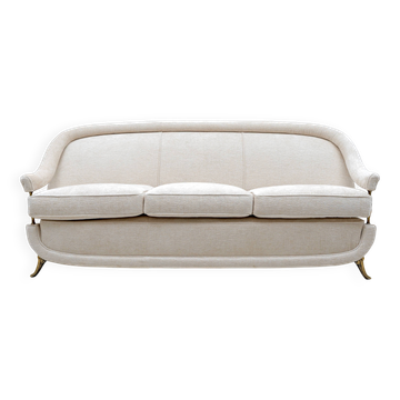 Canapé français des années 50 dans le style Art Déco avec des détails en laiton.