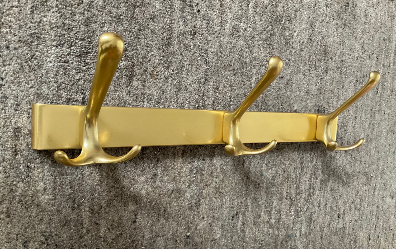 Vintage coat rack in gilded aluminum