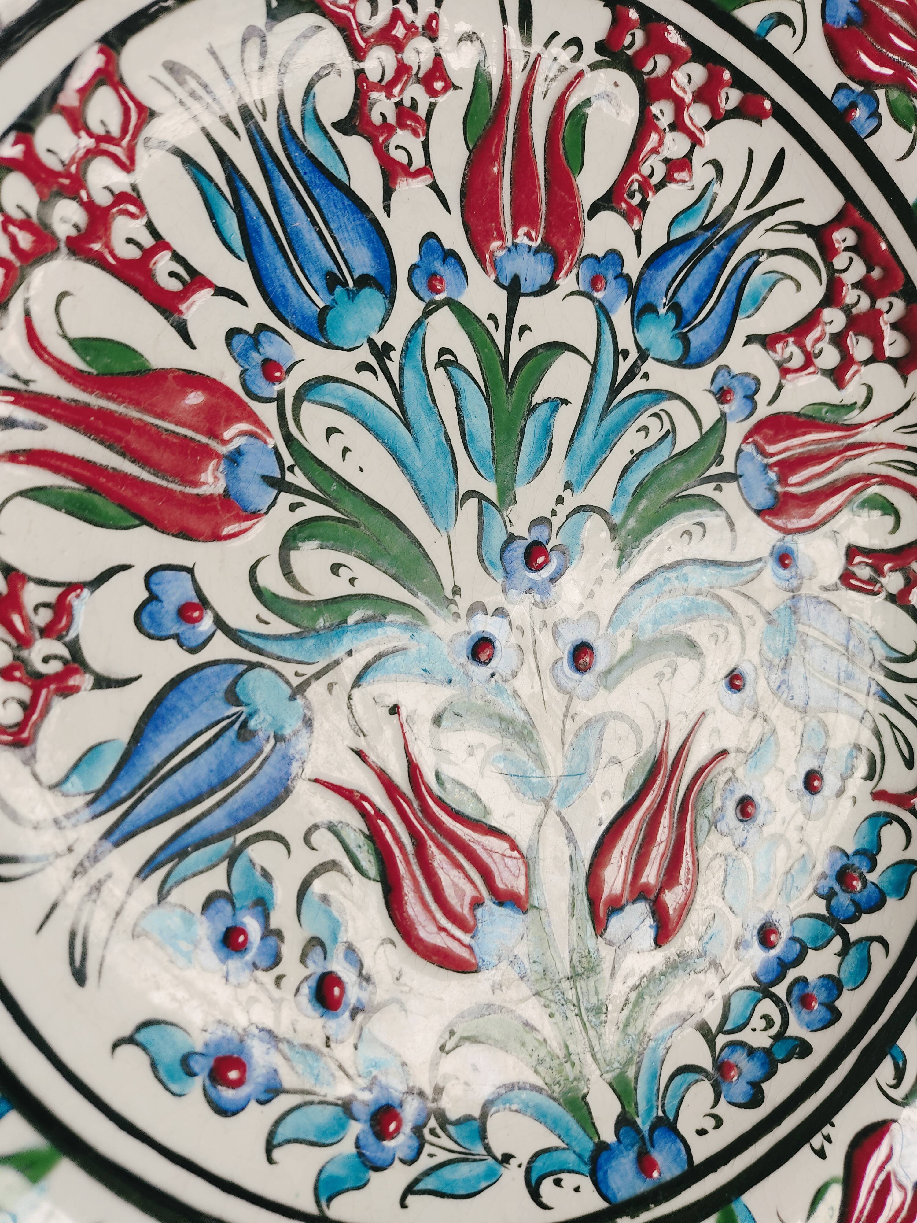 Empty pocket decorated with red and blue flowers