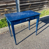Blue-painted wooden table with drawer