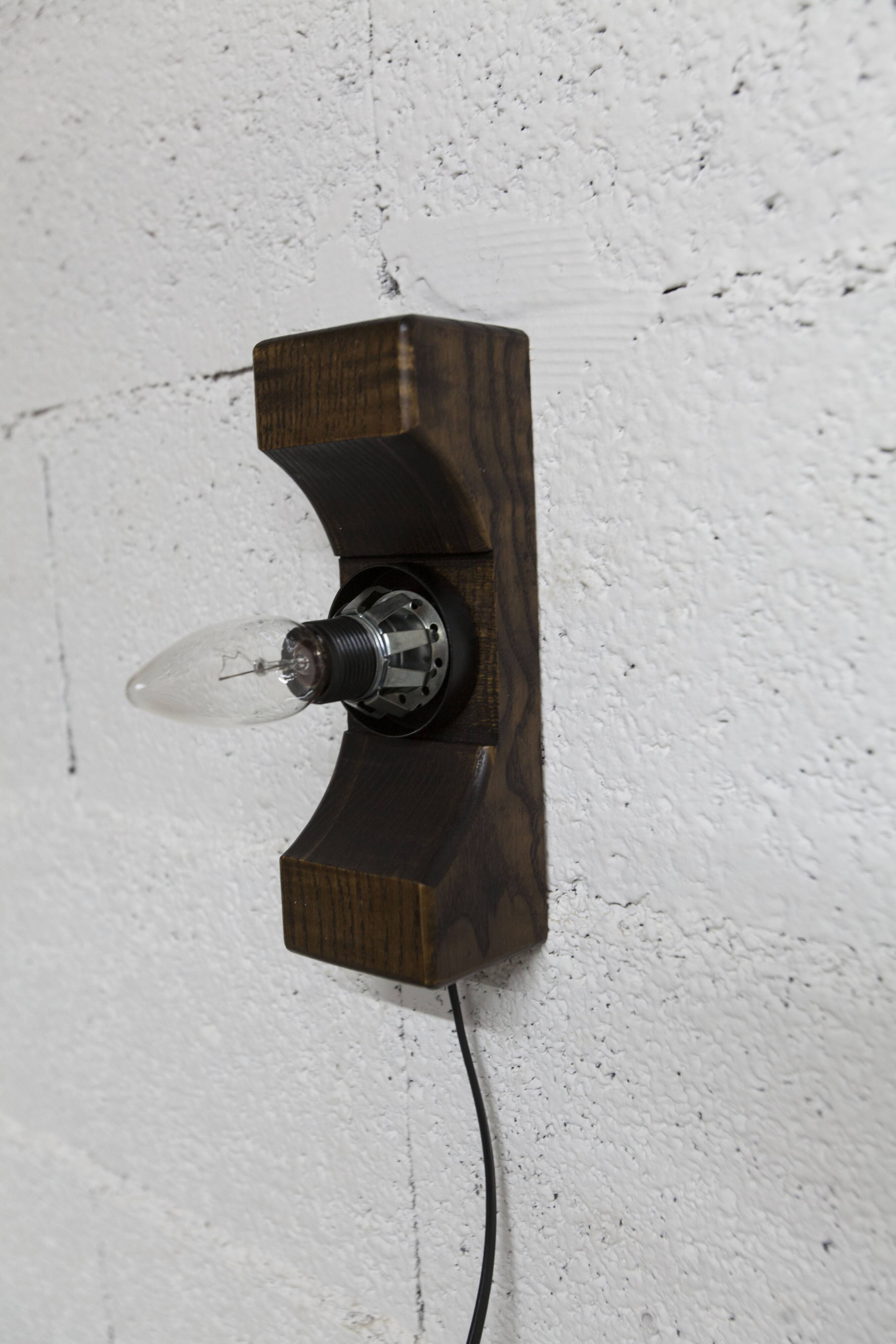 1960s ball wall light in dark wood and amber glass