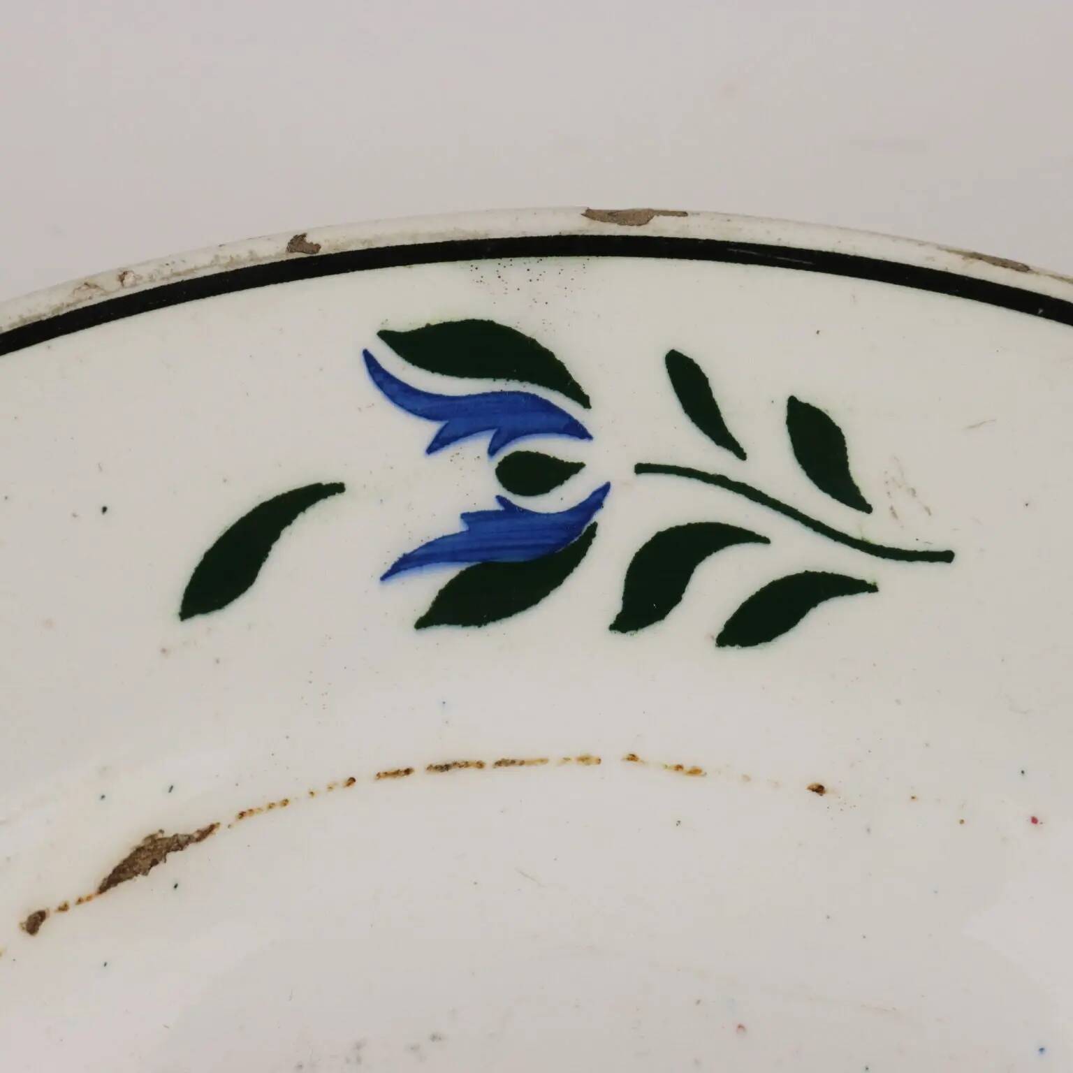Antique ceramic plate made in France, early 20th century.