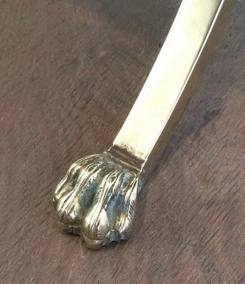 Magazine rack with claw feet. Maison Jansen