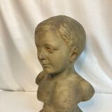 Bust of a young boy, plaster, monogrammed, circa 1900