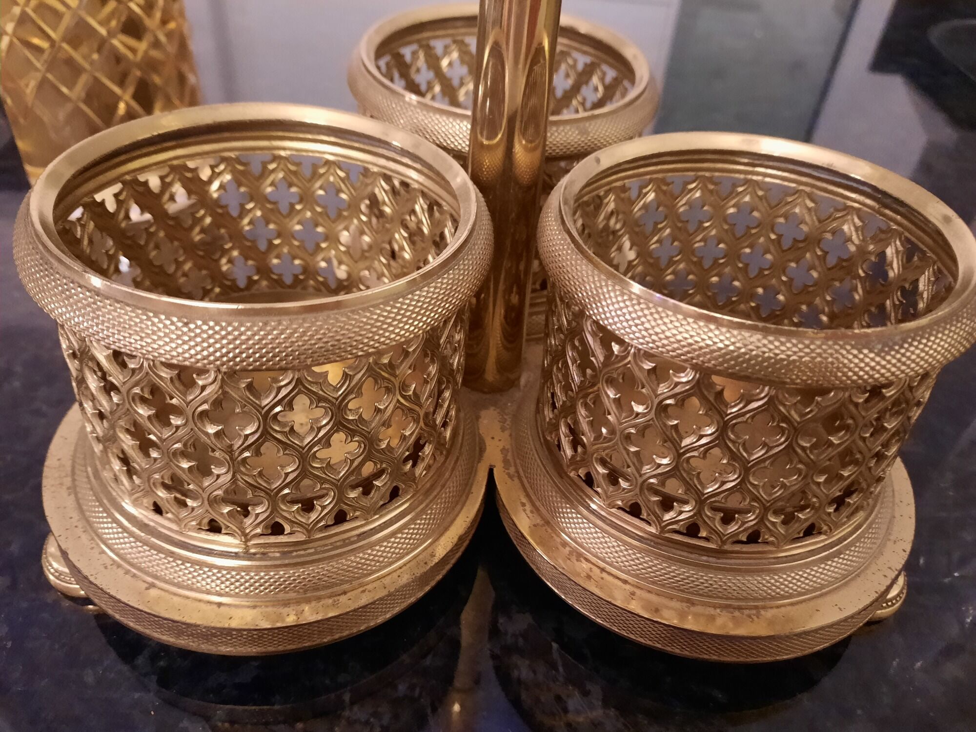 3 crystal decanters diamond cut set of 3 crystal decanters in a gold gold support,