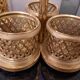 3 crystal decanters diamond cut set of 3 crystal decanters in a gold gold support,