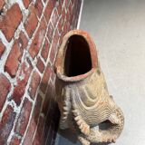 Terracotta umbrella stand in the shape of a fish