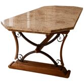 Large polished granite dining table on an oak and iron base.