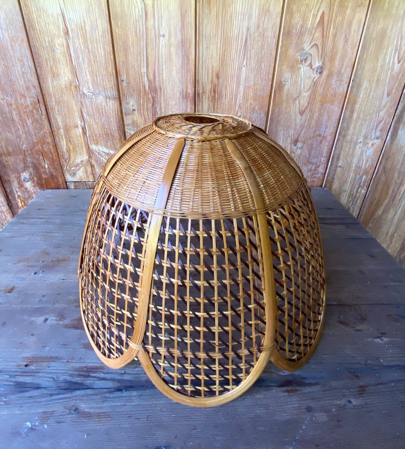 Rattan and cane lampshade in the shape of a flower from the 1970s.