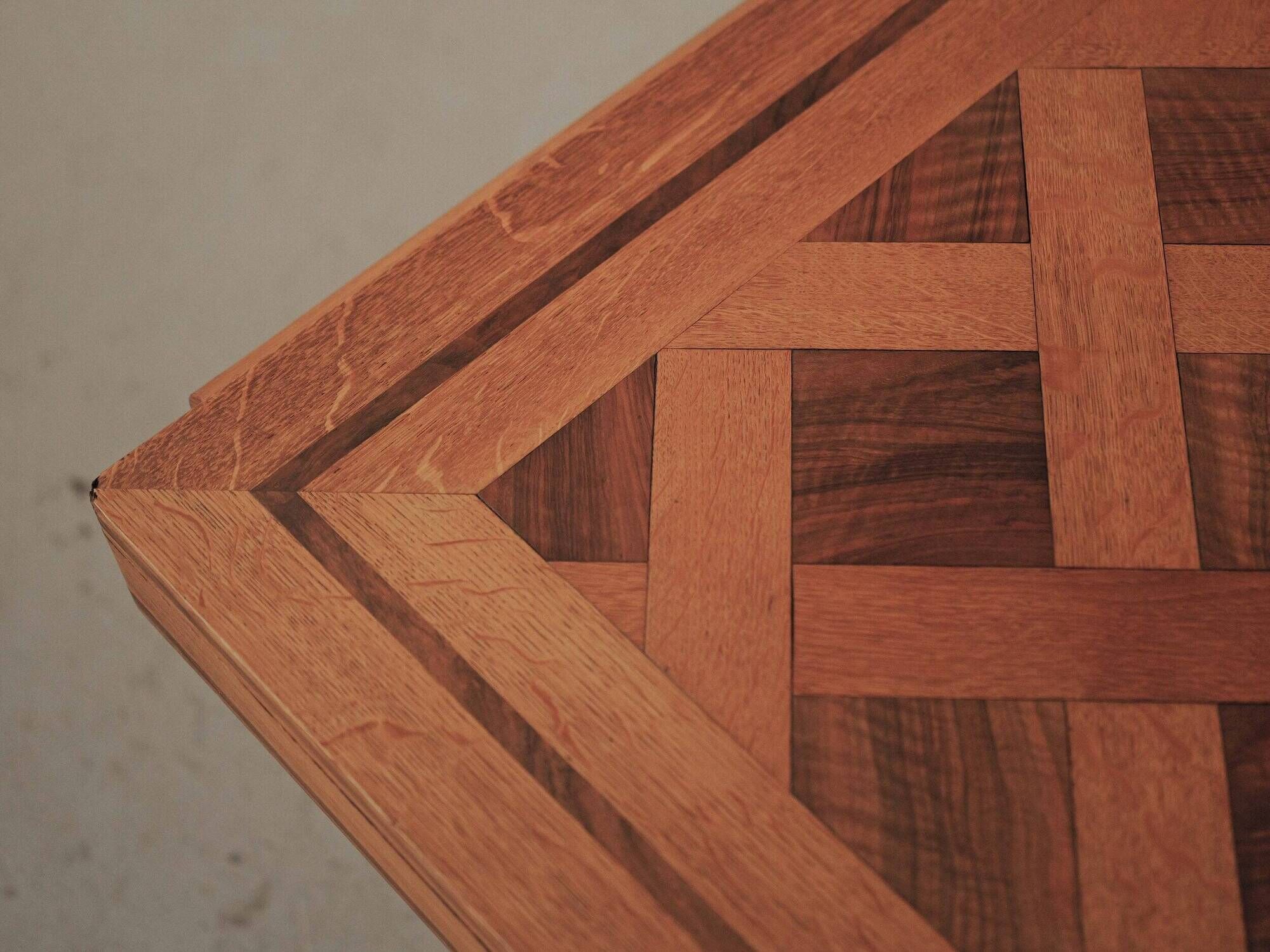 Art Deco table in oak and walnut with marquetry decoration, circa 1940.