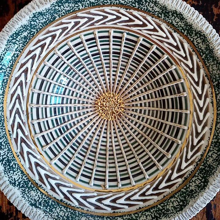 Earthenware fruit bowl - signed and numbered under the base