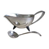 Angora tripod and silver metal spoon