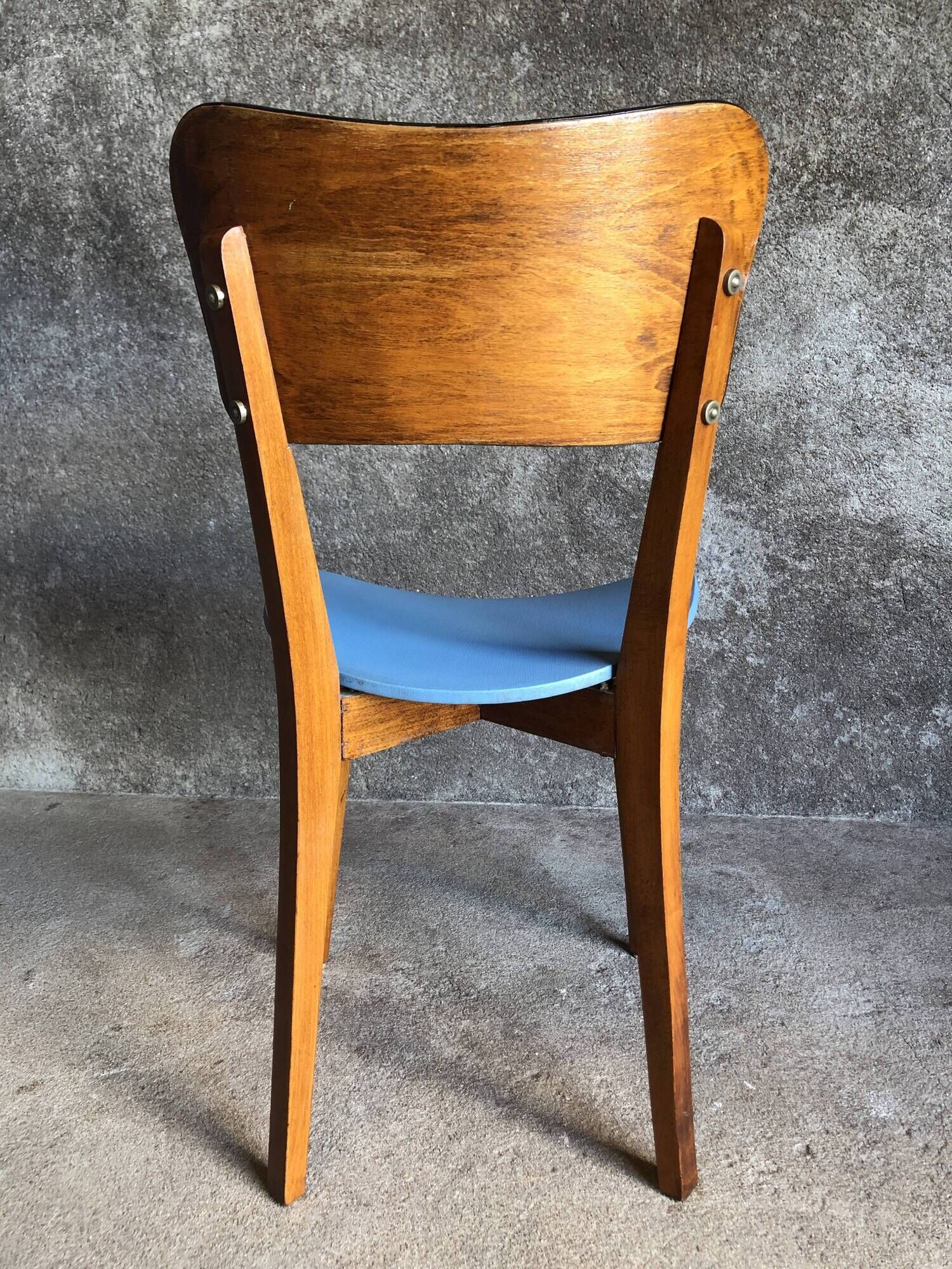 Pair of vintage bistro chairs in wood and light blue vinyl