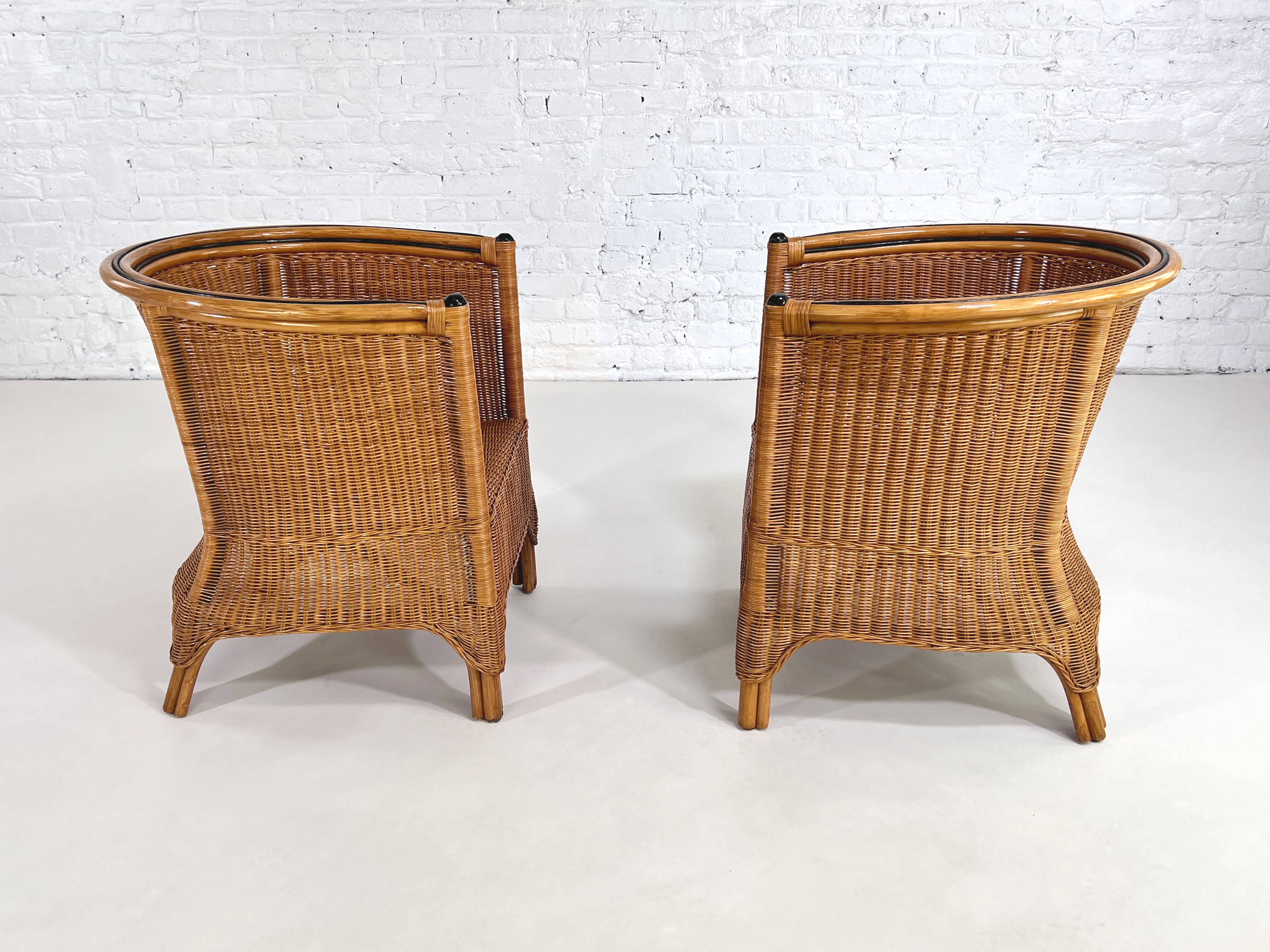 Pair of cabriolet armchairs in wicker and black edging