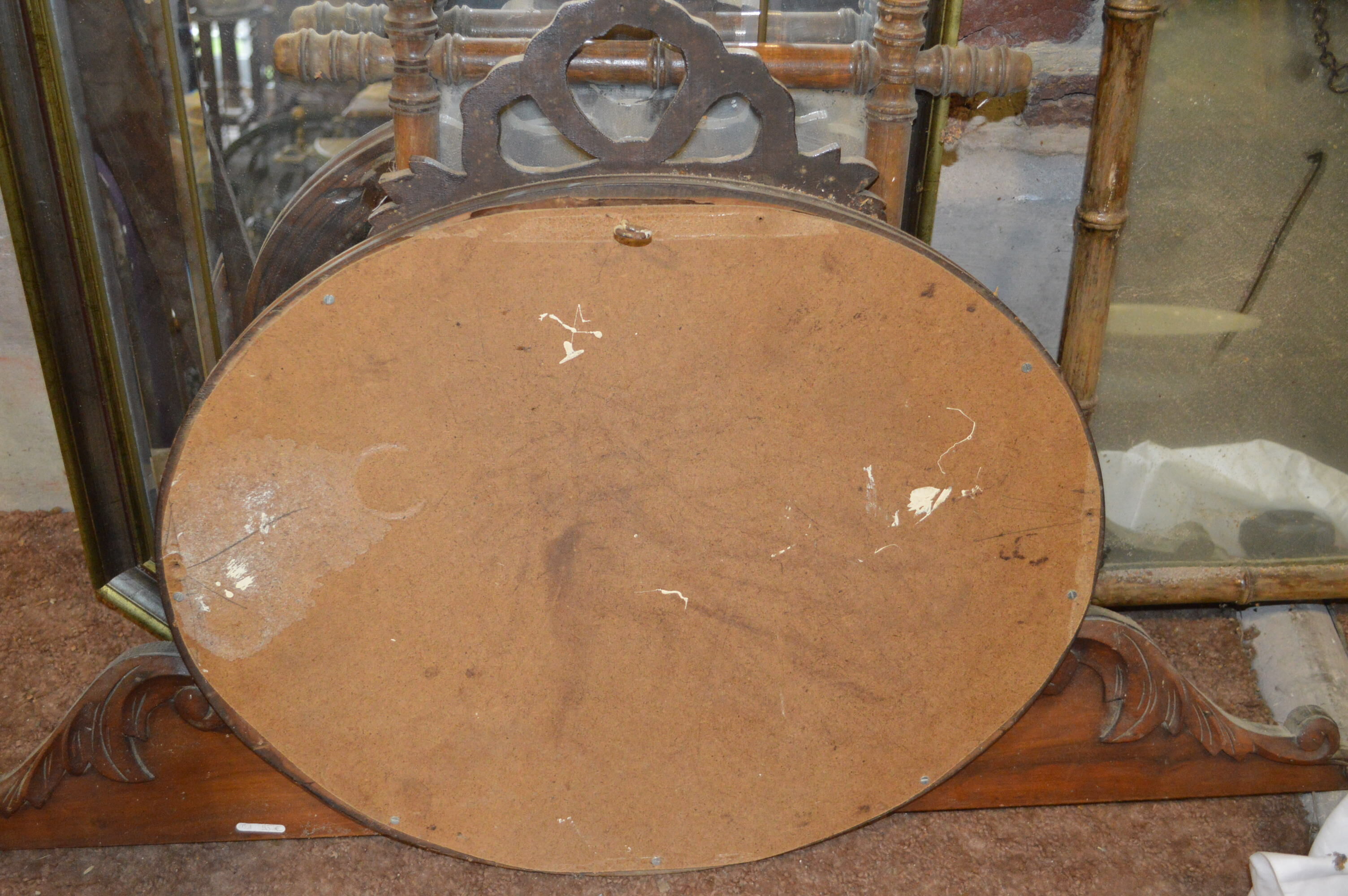 Oval mirror with a node