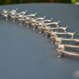 12 silver-plated cat knife rests