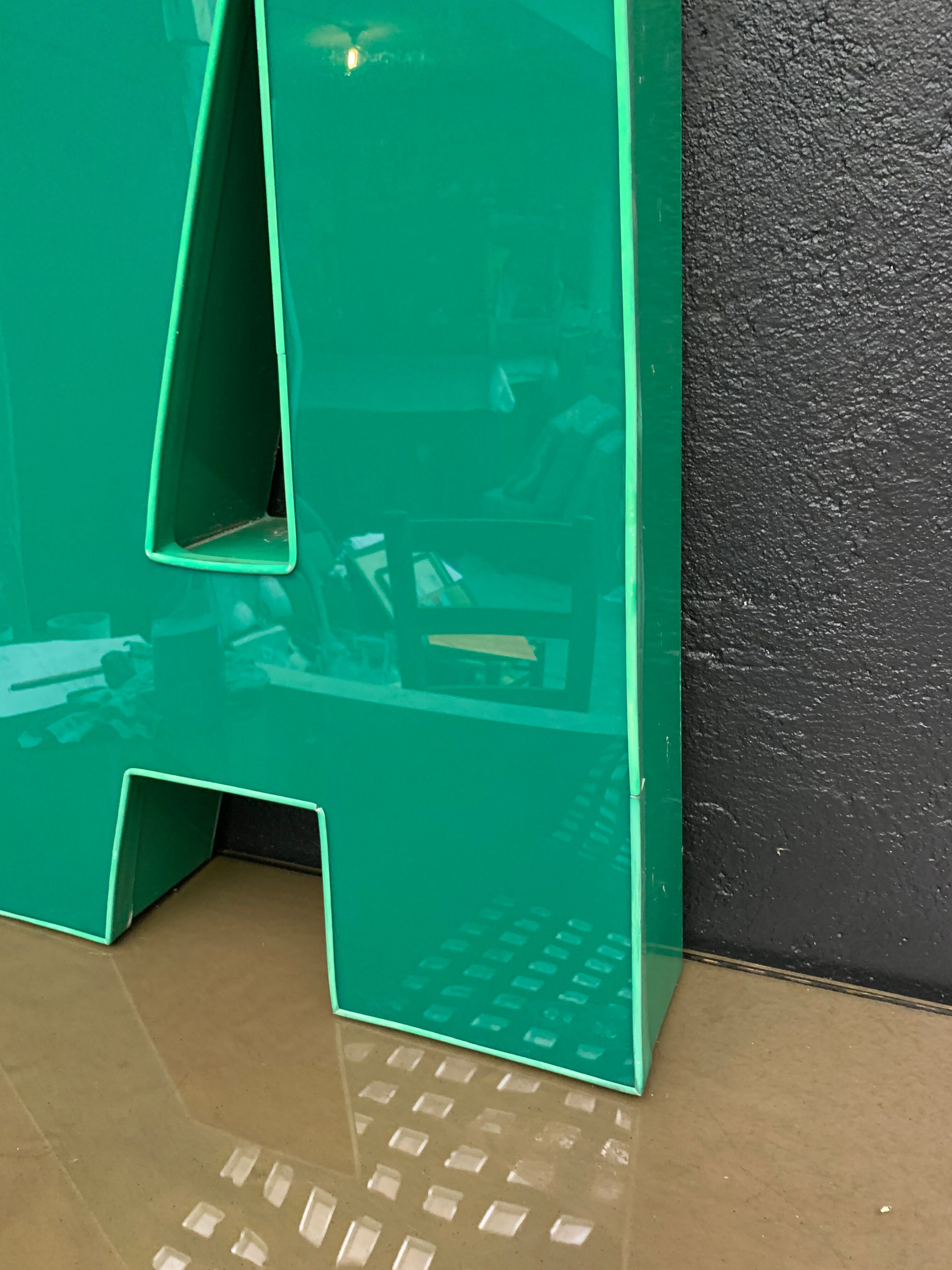 Old letter in metal and plexiglass, industrial decoration