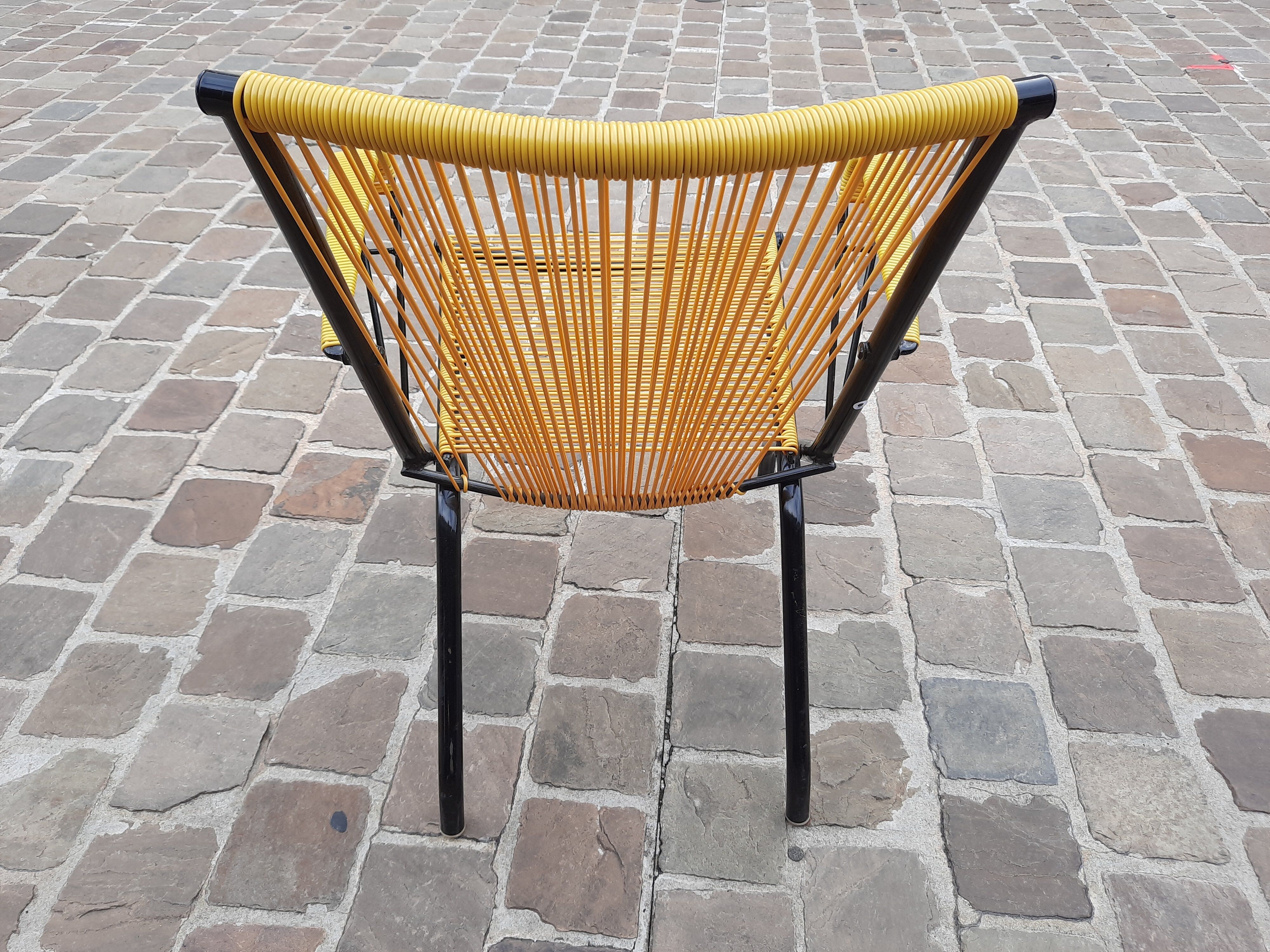 Folding chair in red scoubidou and black metal structure