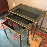 Brass tables and smoked glasses