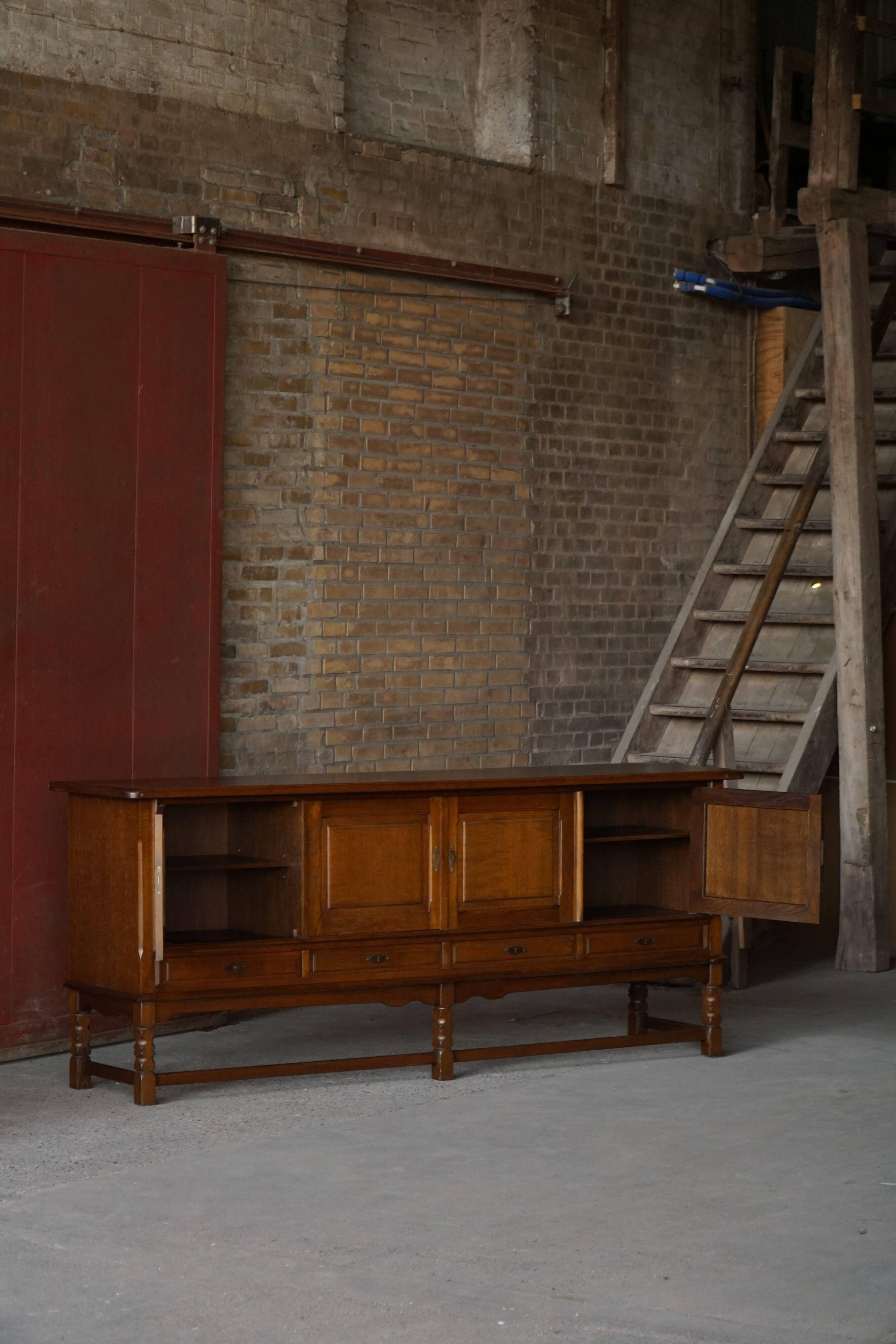 Danish enfilade from the mid-modern century in dark stained oak, 1960s.