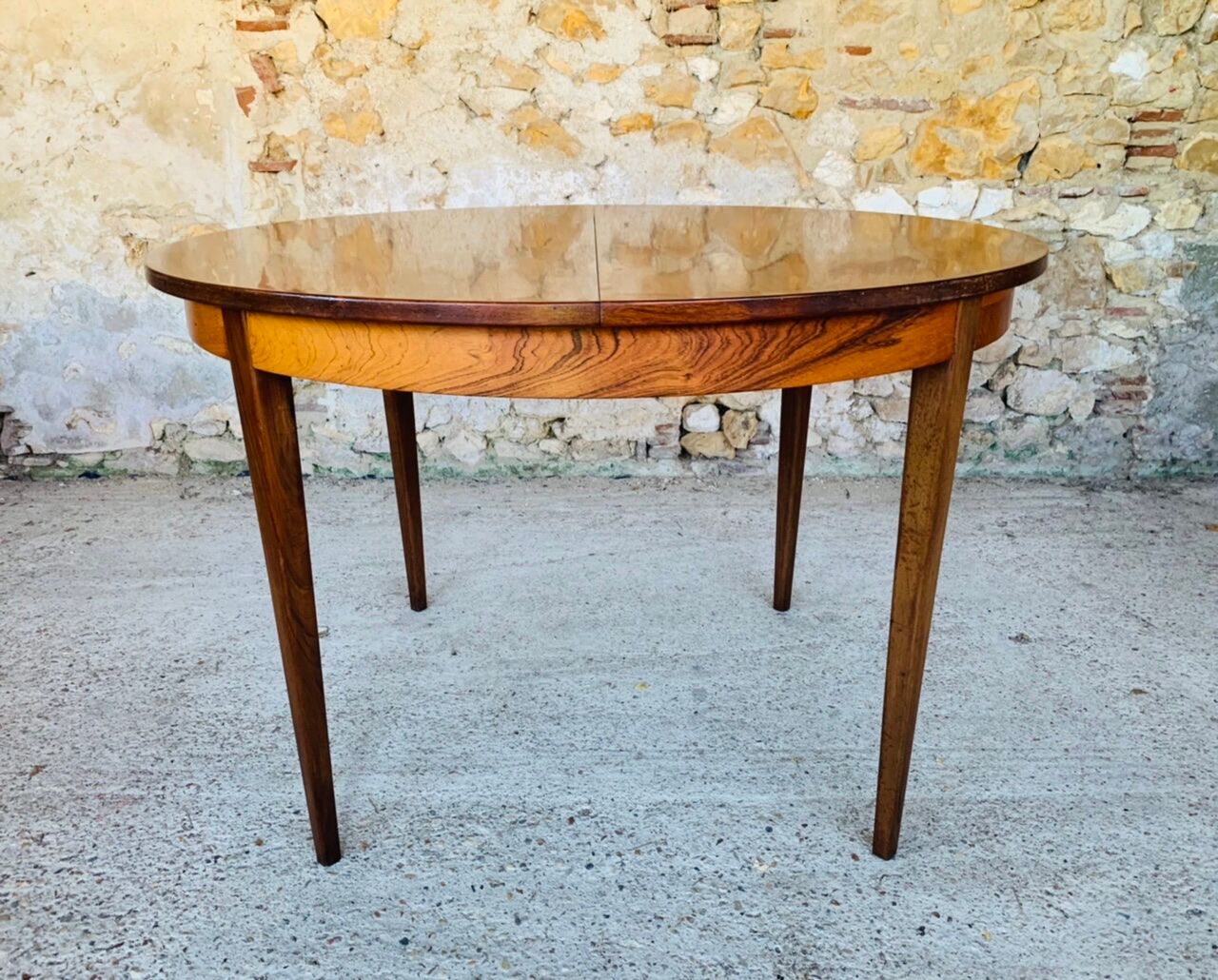 Extendable dining table with butterfly extensions in rosewood circa 60's