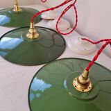 Trio of enameled sheet metal pendant lights