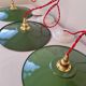 Trio of enameled sheet metal pendant lights