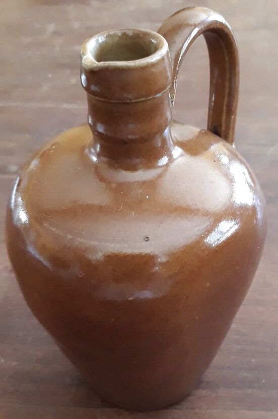 Small pitcher sandstone - 60s/70s - " Federal law forbids dirty. Or reuse of this bottles "