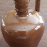 Small pitcher sandstone - 60s/70s - " Federal law forbids dirty. Or reuse of this bottles "