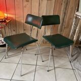 Pair of green faux leather chairs
