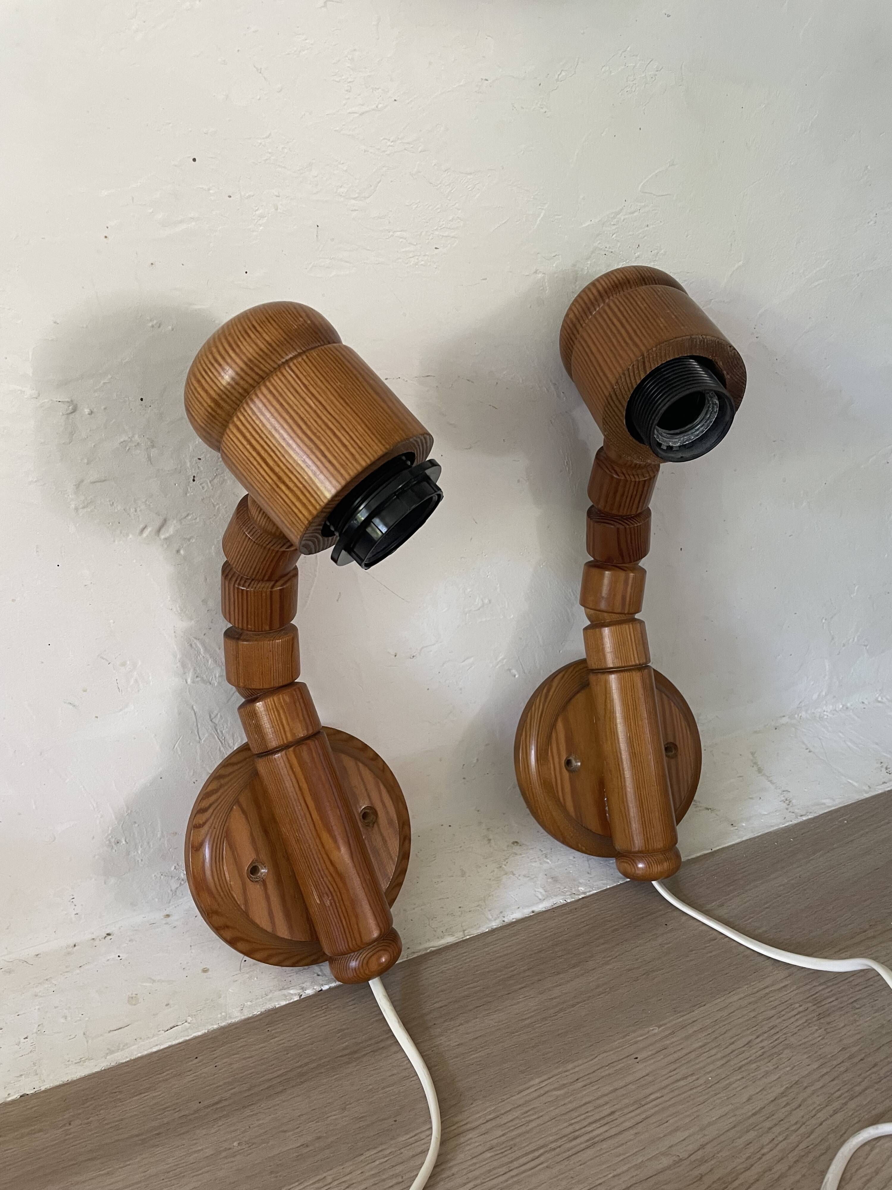 Pair of articulated Scandinavian wall lights SOLBACKEN in vintage wood